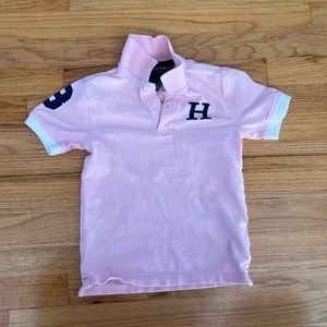 Tommy Hilfiger pink polo shirt with short sleeves. Boy size 6